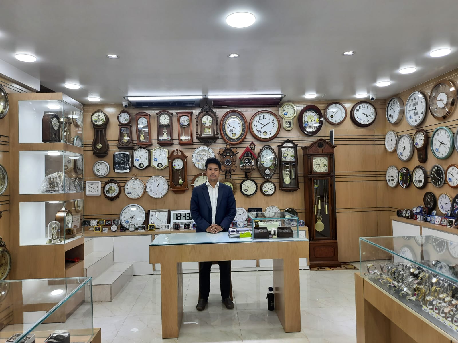 A watch movement being assembled by a watchmaker.